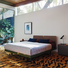 Michel Bed in Forest and Walnut in a bedroom