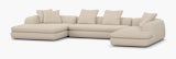 A Atlason Americano Asymmetrical Double Chaise Sectional in cream viewed from an angle.